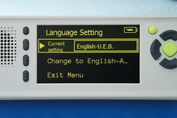 Close up of the Language Setting menu. It displays “Language Setting, Current setting: English-U.E.B., Change to English-A…, Exit Menu.” English U.E.B is selected.