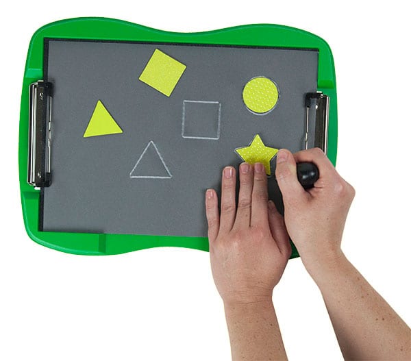 hands tracing geometric shapes on the tactile doodle with a stylus