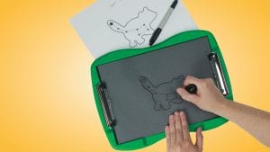 green tactile doodle frame, back body, white lines showing the tactile drawing of an animal. a hand holds the stylus. The image is a tracing.