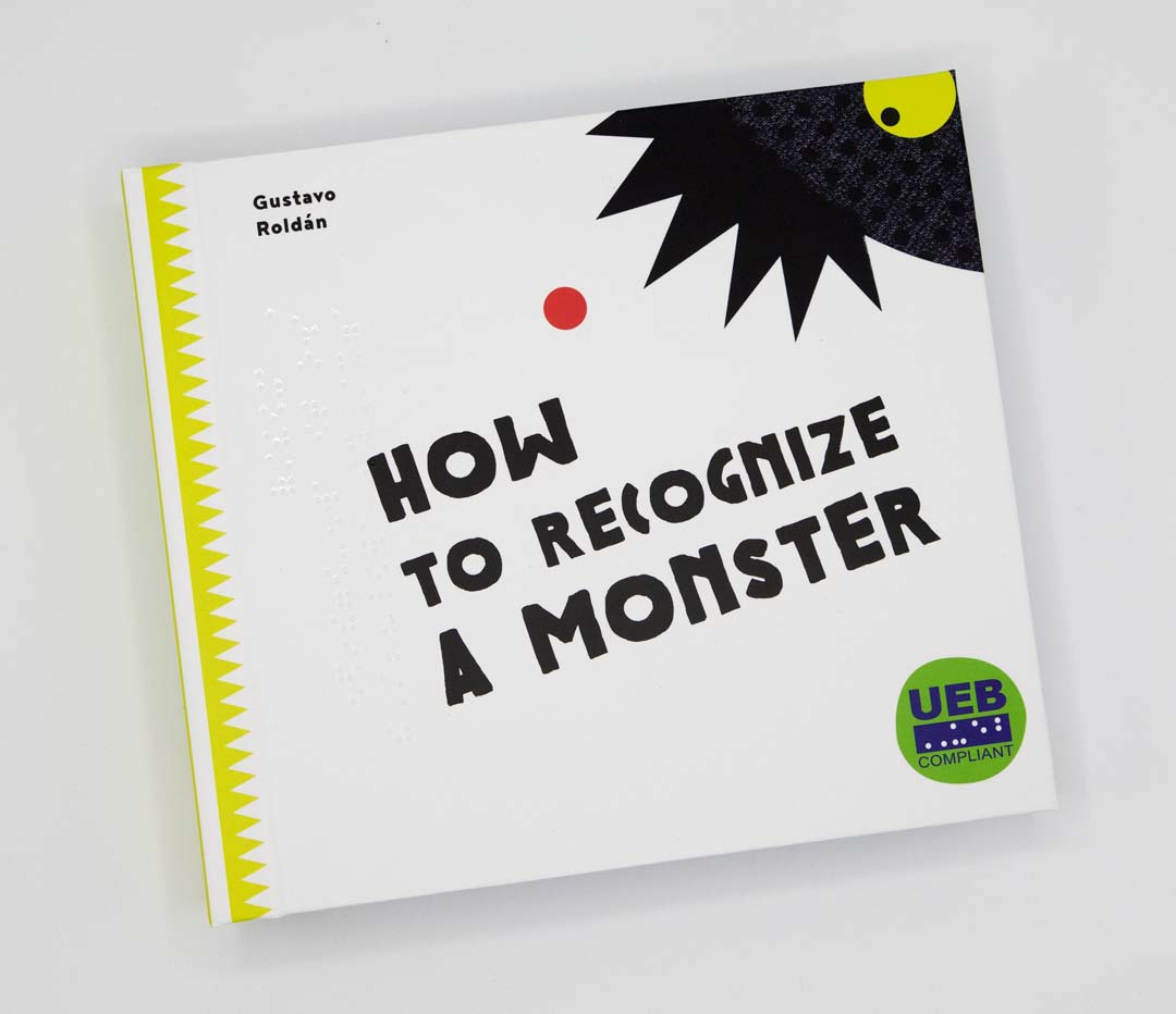 Cover of How to Recognize a Monster by Gustavo Roldán showing a monster resembling a shadow with a yellow eye peering from the corner of the cover toward a red dot above the book title. UEB Compliant.